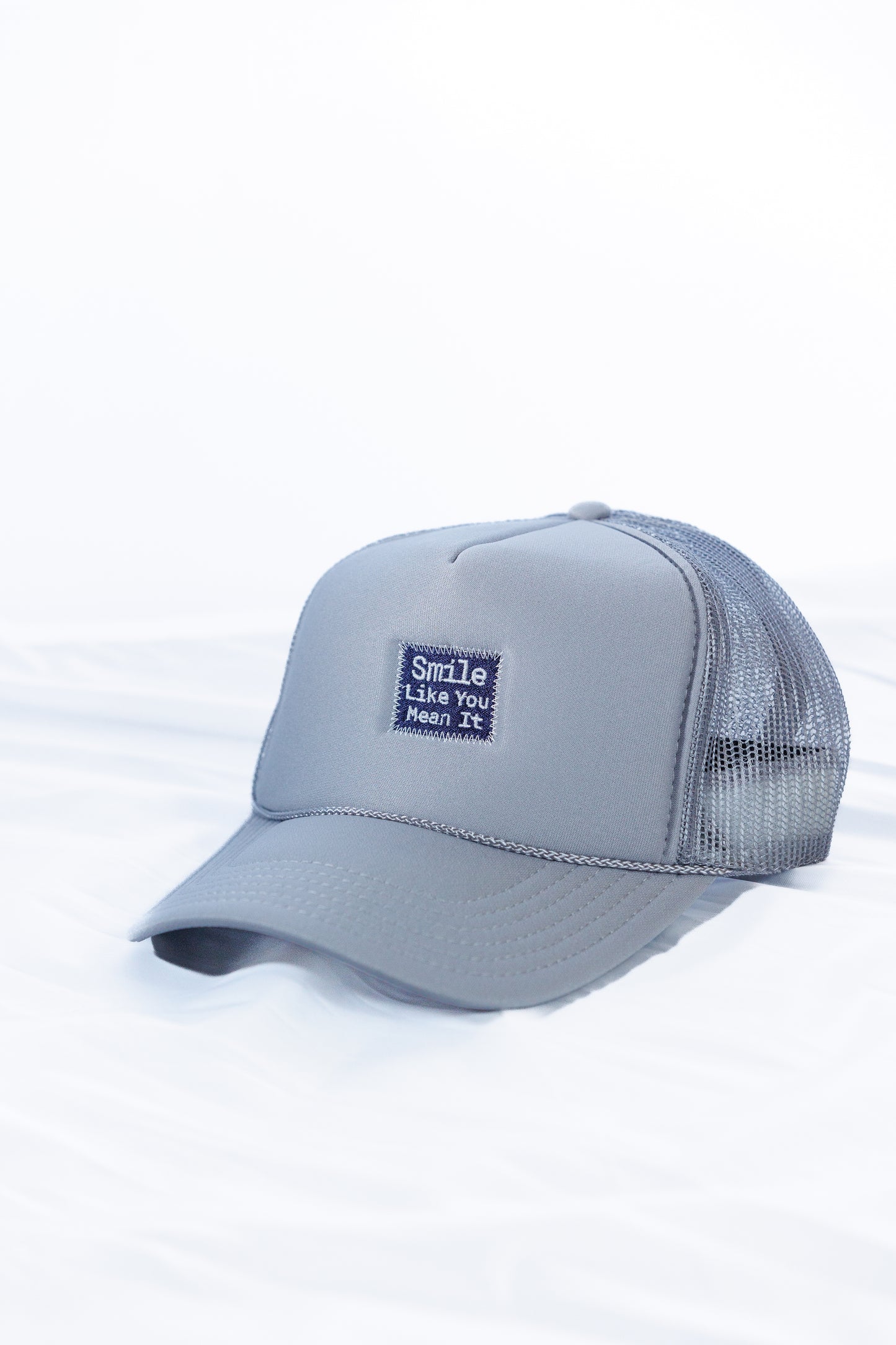 "Smile Like You Mean It" Trucker Hat