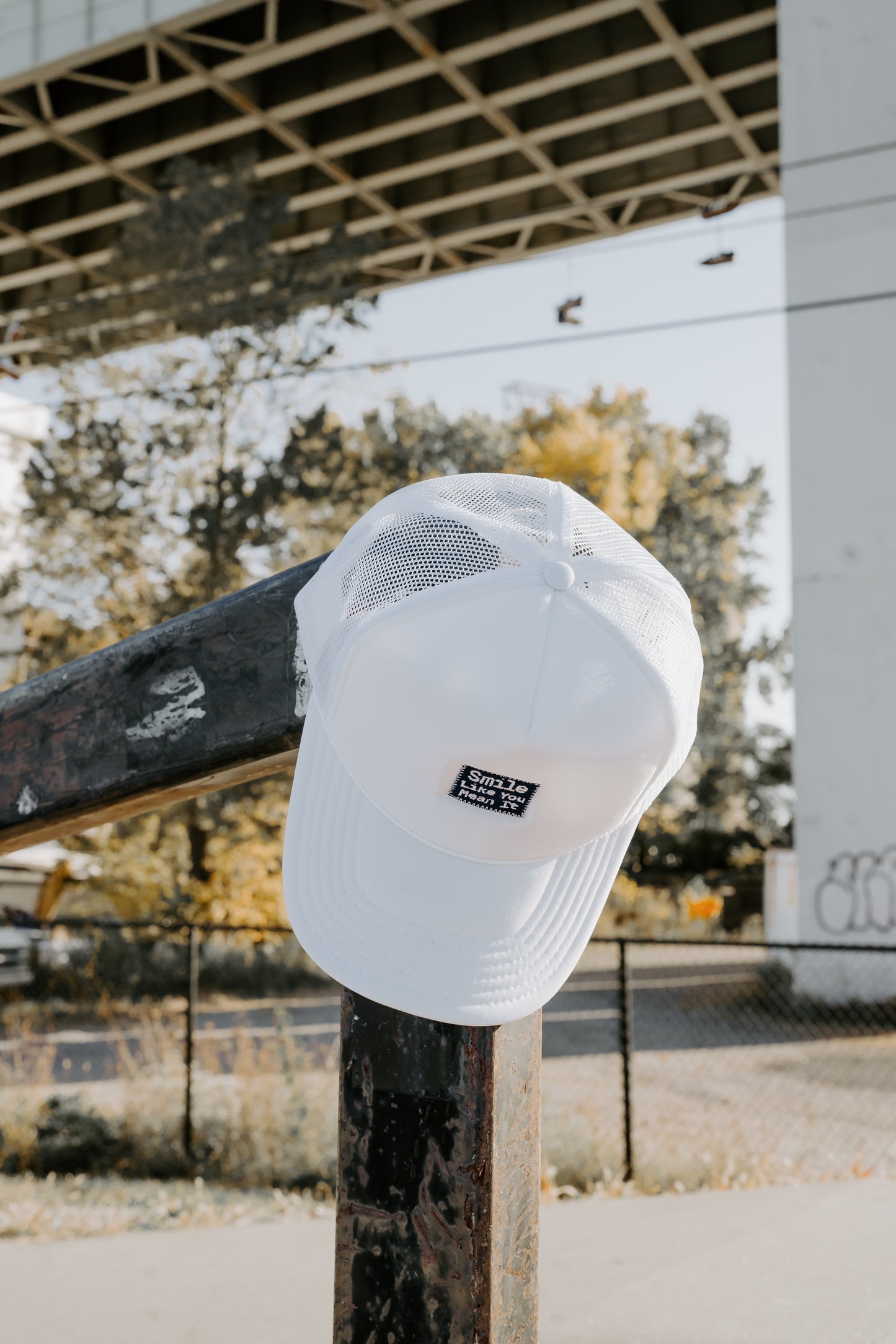 "Smile Like You Mean It" Trucker Hat